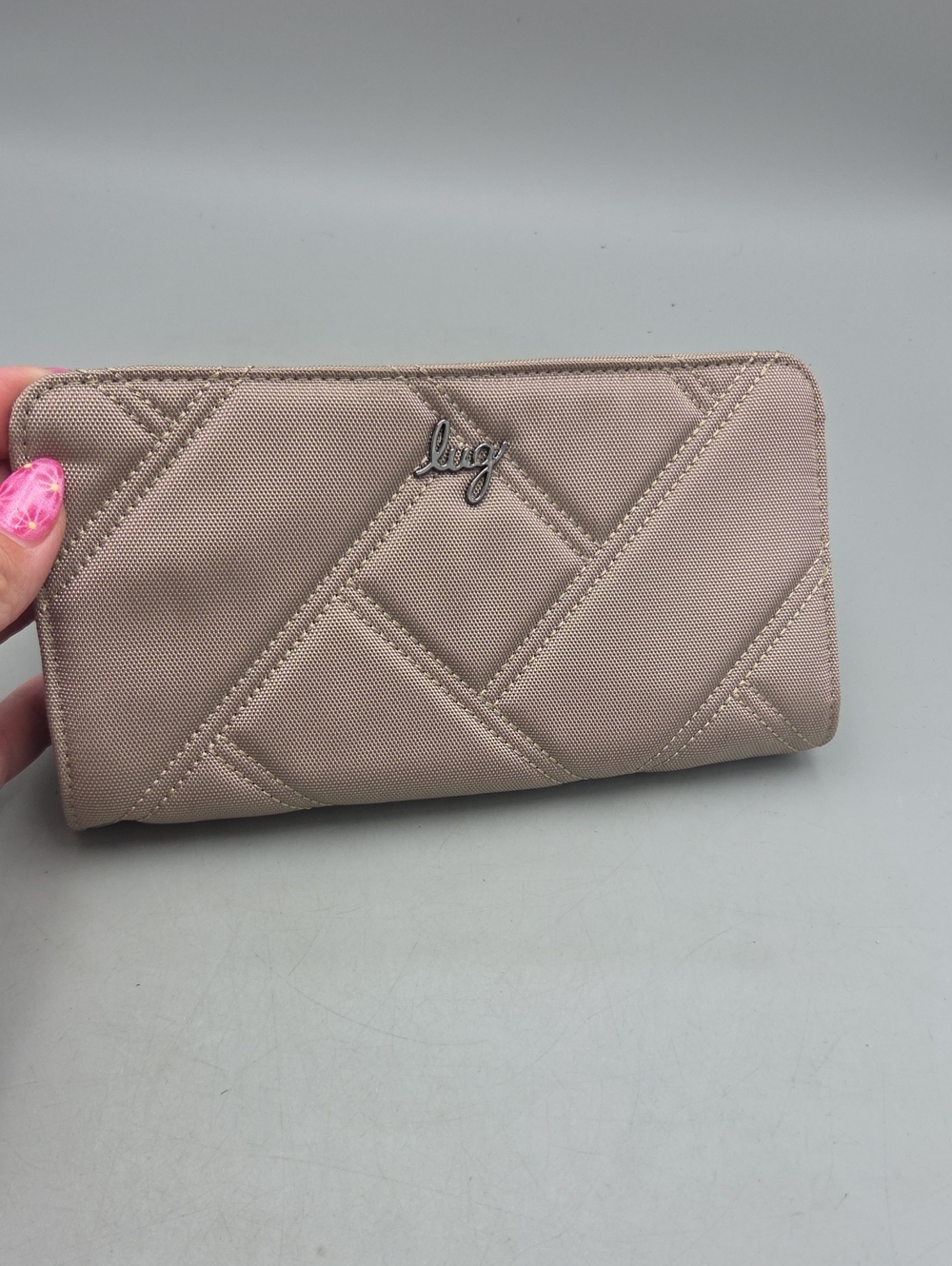 Lug Arabesque Ultra X Zip RFID Wallet in a sand Beige color